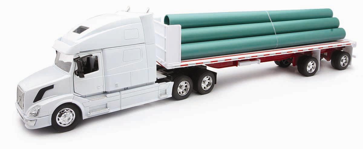 Camion 1/32&egrave;me VOLVO VN780 remorque plate avec tuyaux
