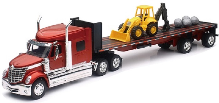 Camion 1/32&egrave;me INTERNATIONAL LONESTAR remorque plate avec tracteur et rochers